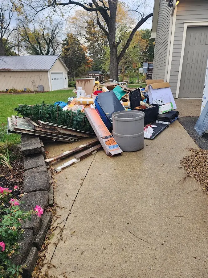 Dumpster being loaded with debris for Commercial Dumpster Rental in China